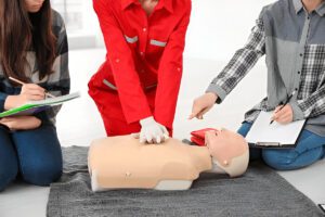 Instructor demonstrating CPR techniques during certification renewal class