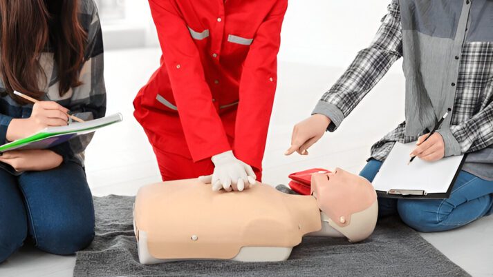 Instructor demonstrating CPR techniques during certification renewal class