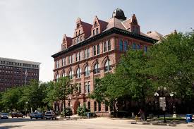 Historic building in Illinois surrounded by greenery, representing the local community and potential training venue for Safety Is A Mindset's emergency preparedness programs.