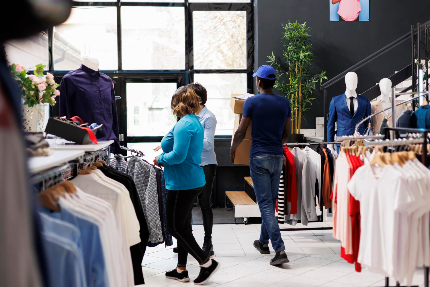 Customers browsing apparel in a boutique retail store | Safety Is A Mindset